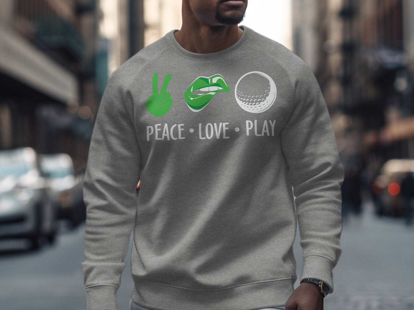 Gray sweatshirt with peace sign, lips, and golf ball icons and "PEACE LOVE PLAY".