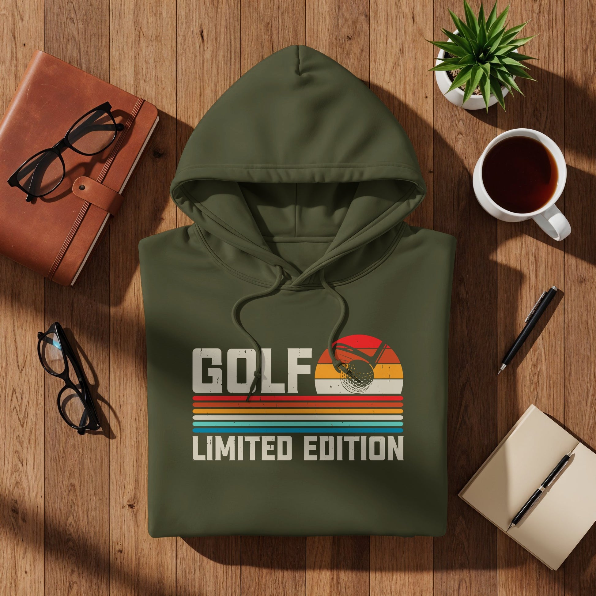 Green hoodie with "GOLF LIMITED EDITION" text and golf ball sunset graphic.