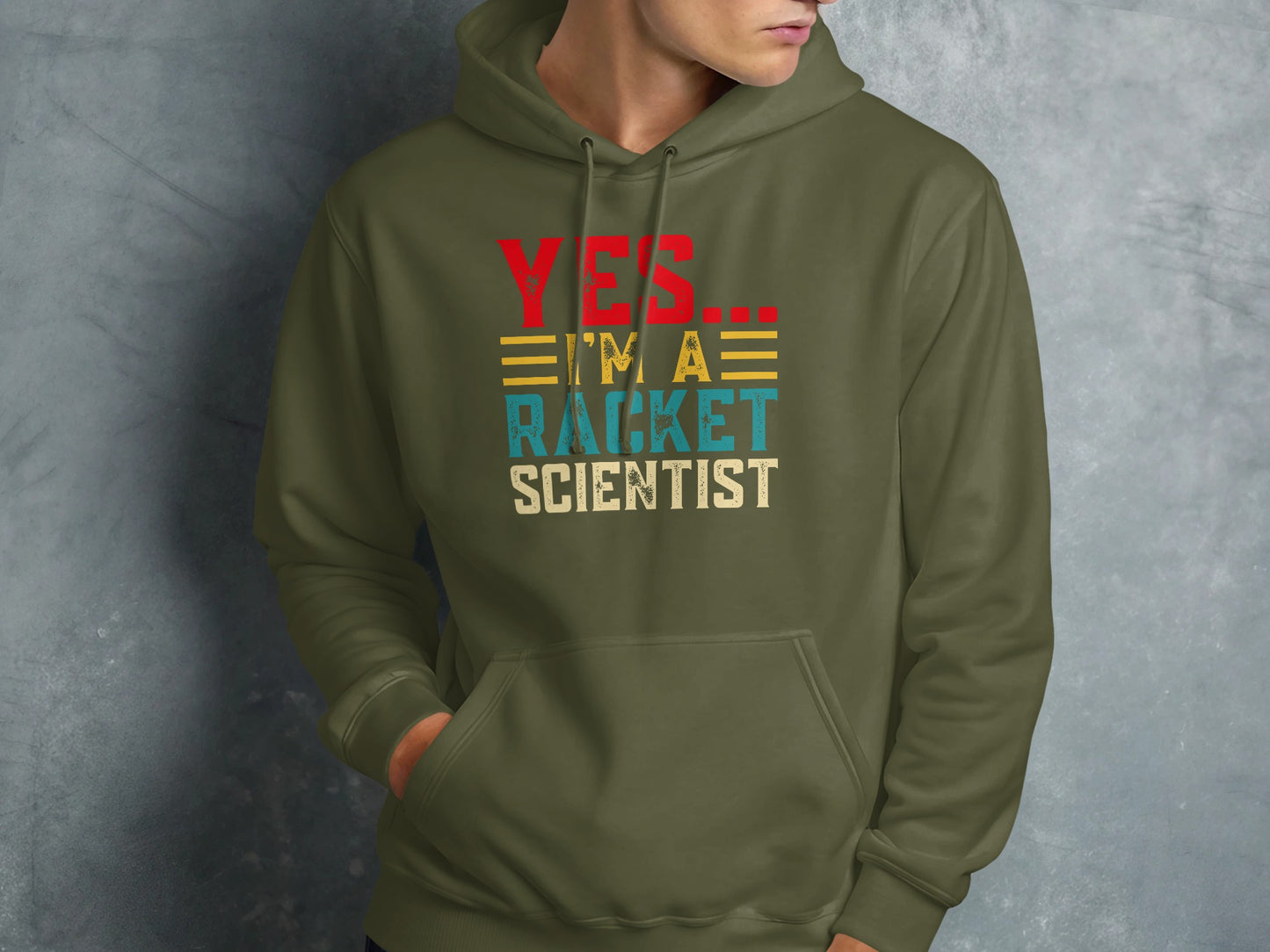 Green hoodie with red, yellow, and blue text: YES... I'M A RACKET SCIENTIST.