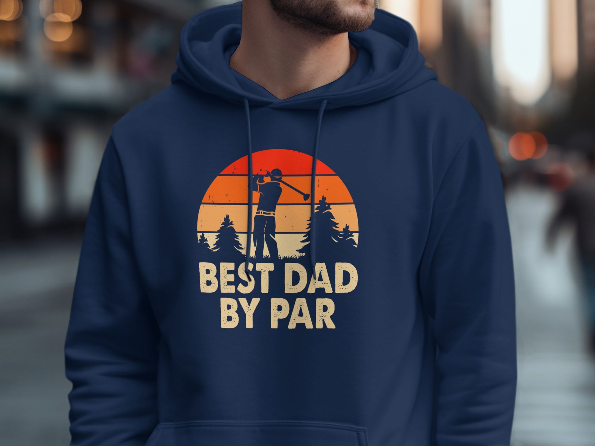 Men's navy hoodie with "BEST DAD BY PAR" golf graphic.
