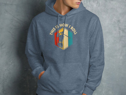 Blue hoodie with hexagonal graphic featuring text and silhouette.