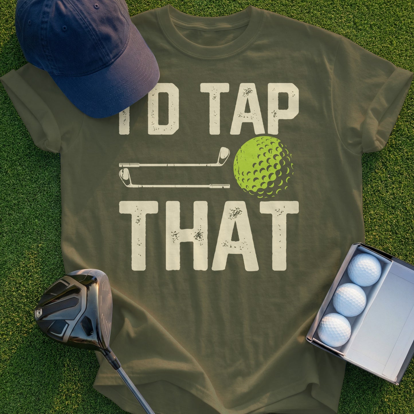 T-shirt with "TO TAP THAT" text, golf club, and golf ball.