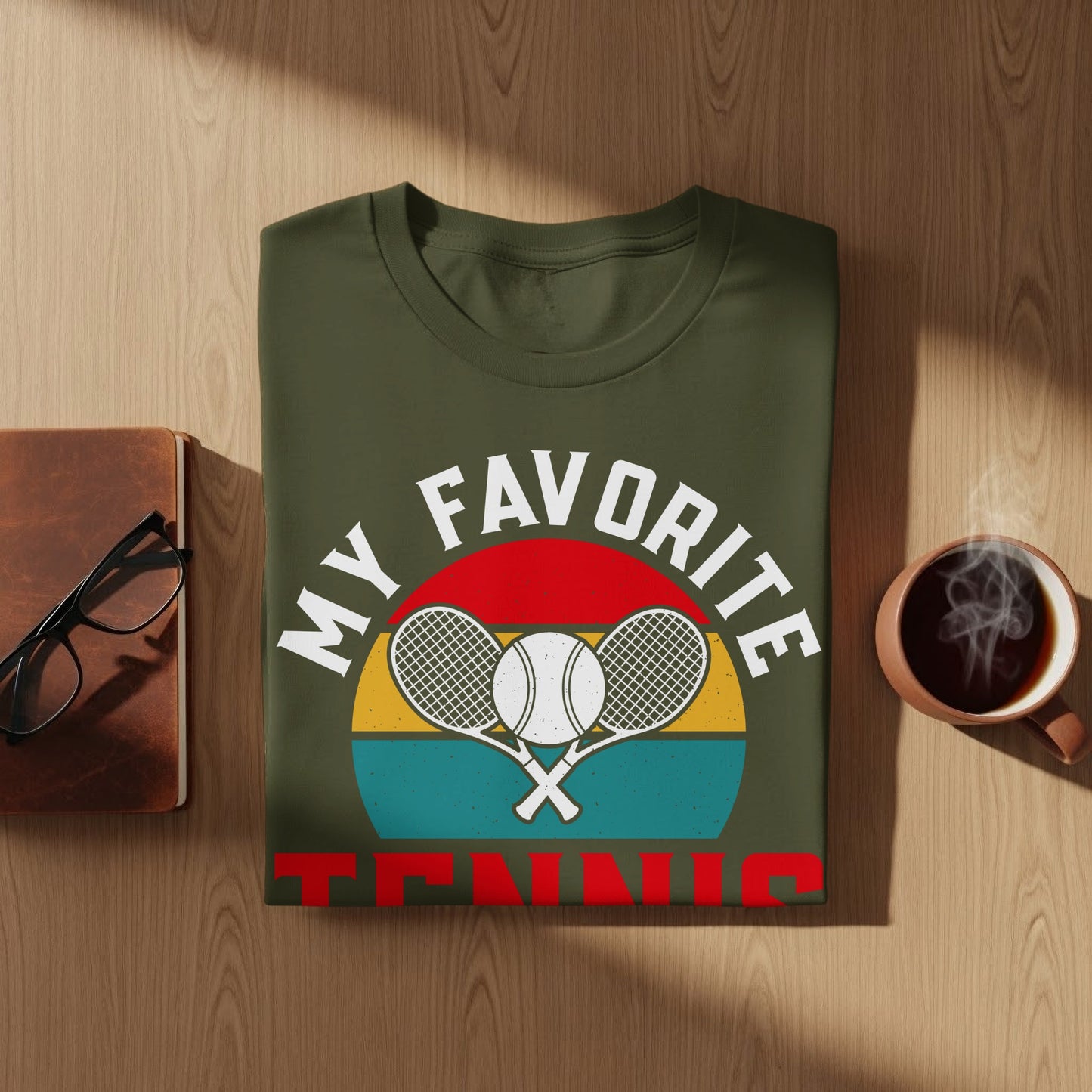 Olive green t-shirt with "MY FAVORITE TENNIS" and crossed rackets graphic.