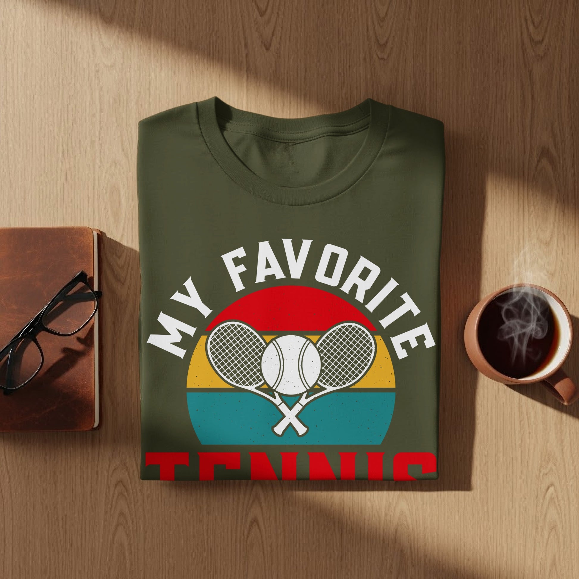 Olive green t-shirt with "MY FAVORITE TENNIS" and crossed rackets graphic.