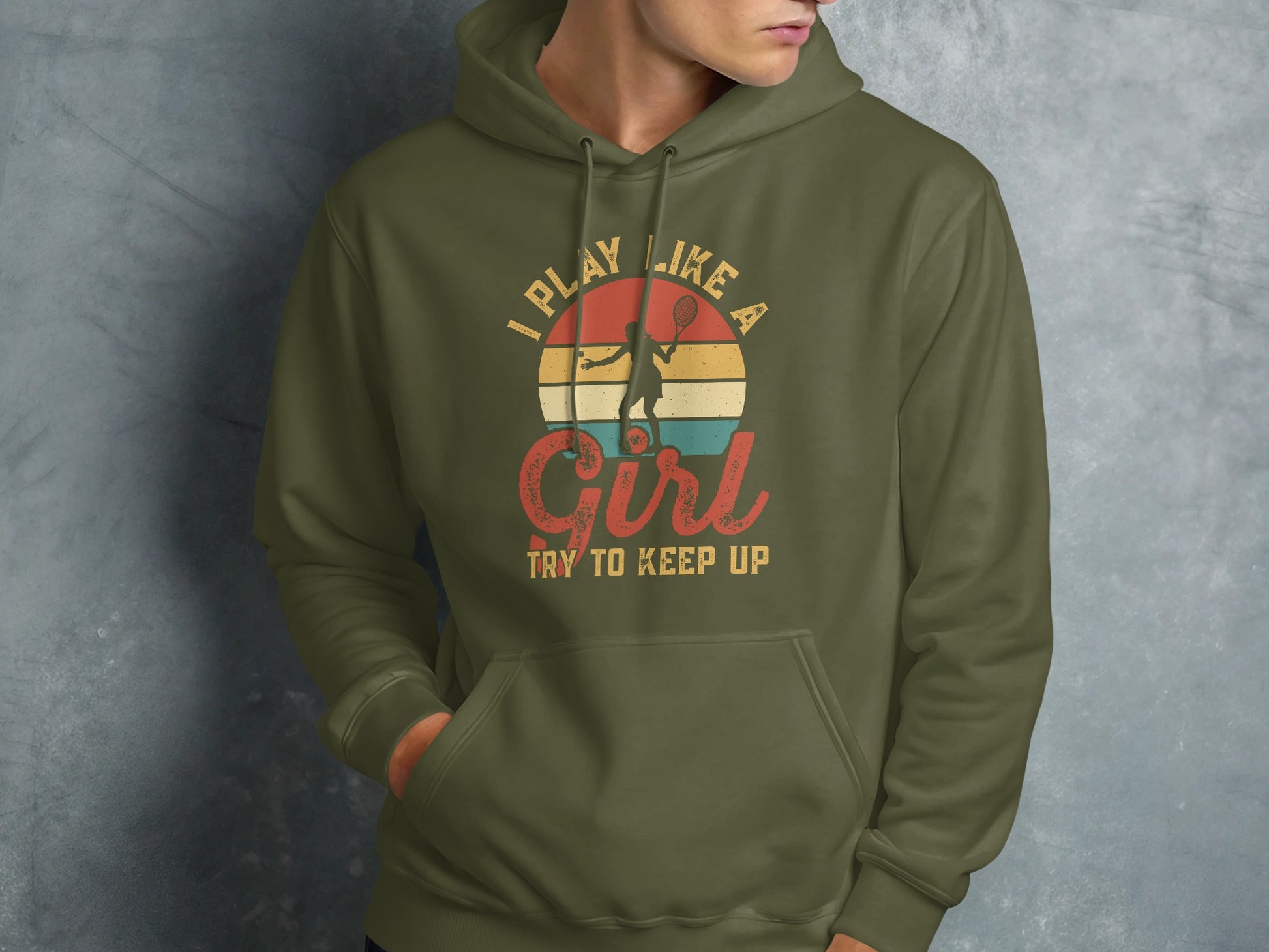 Green hoodie with "I Play Like a Girl Try to Keep Up" text and tennis graphic.