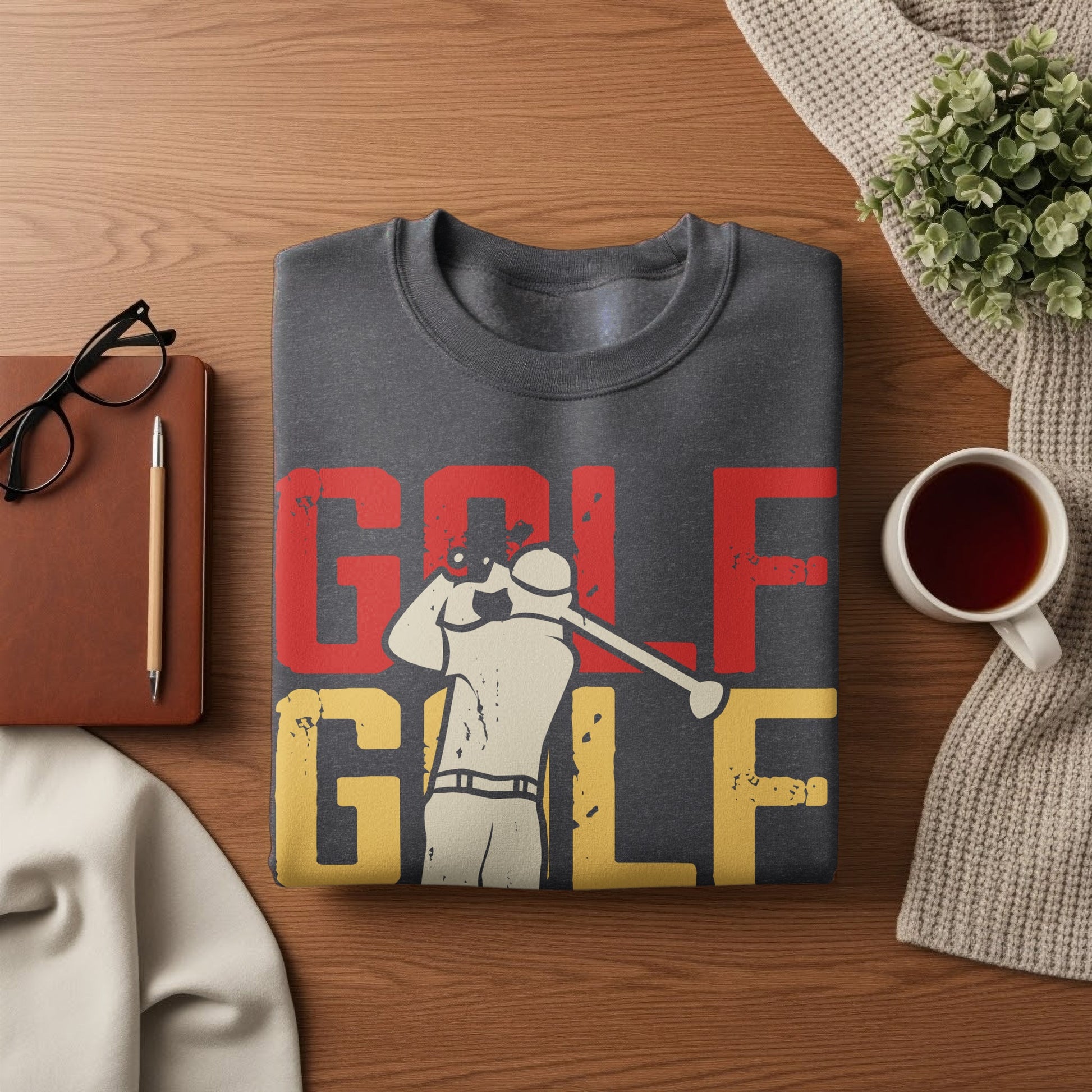 Dark grey sweatshirt with "GOLF GOLF" text and golfer graphic.