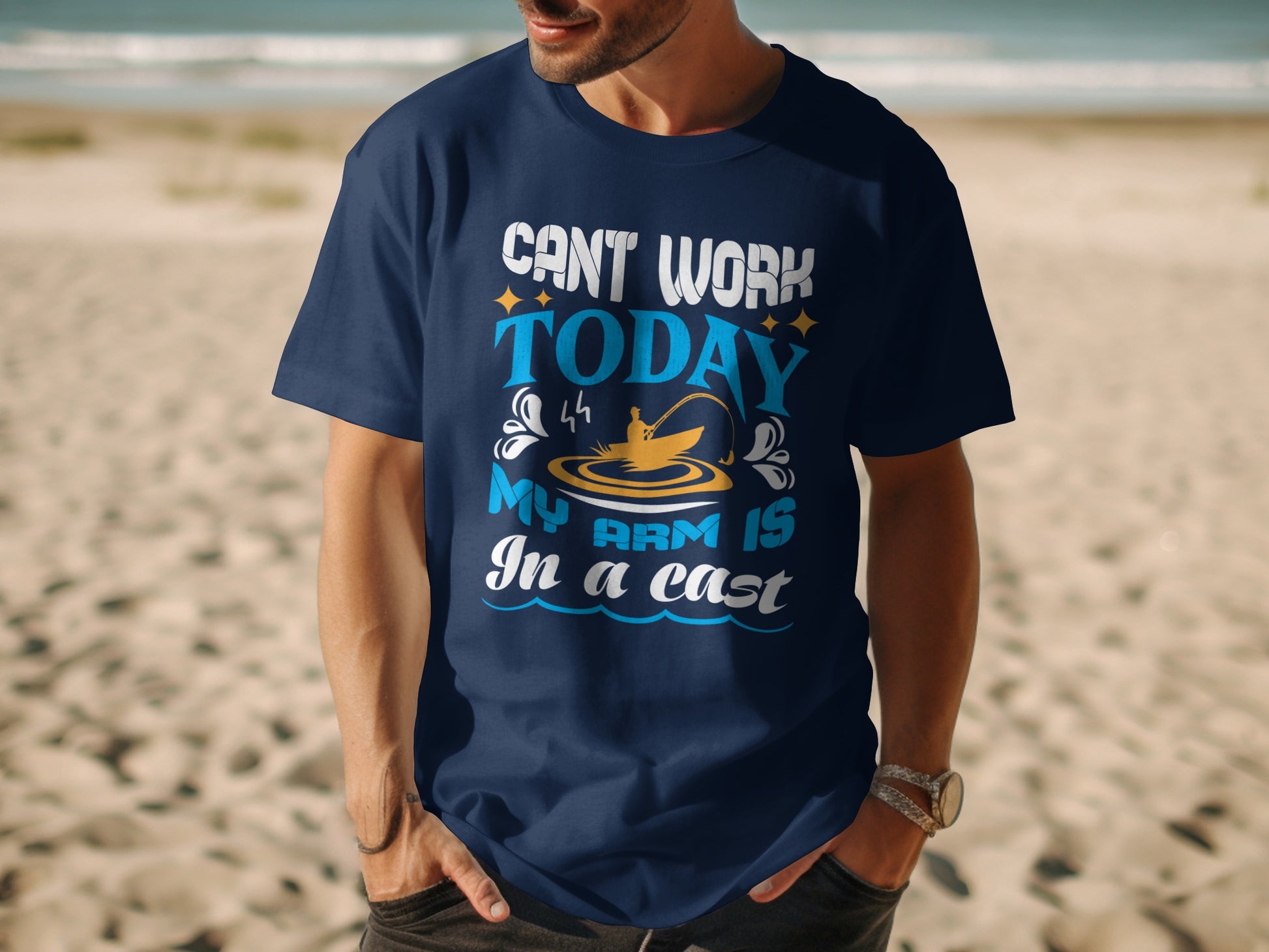 Navy t-shirt with "Can't work today, my arm is in a cast" text and fishing graphic.