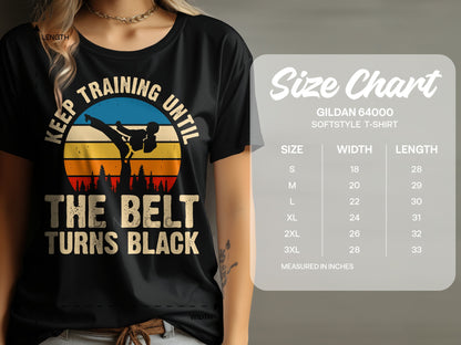Black t-shirt with "Keep Training Until The Belt Turns Black" graphic and size chart.