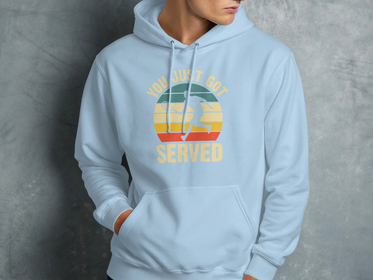 Light blue hoodie with a retro graphic of a tennis player and "YOU JUST GOT SERVED" text.