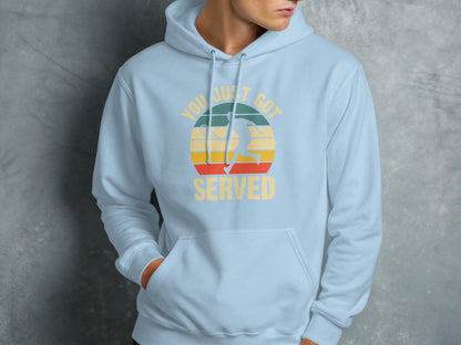 Light blue hoodie with a retro graphic of a tennis player and "YOU JUST GOT SERVED" text.