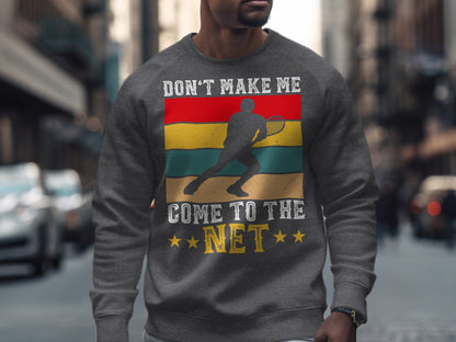Gray sweatshirt with "Don't Make Me Come to the Net" and tennis player graphic.