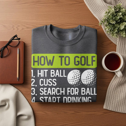 Dark gray sweatshirt with "How to Golf" and a humorous four-step list.