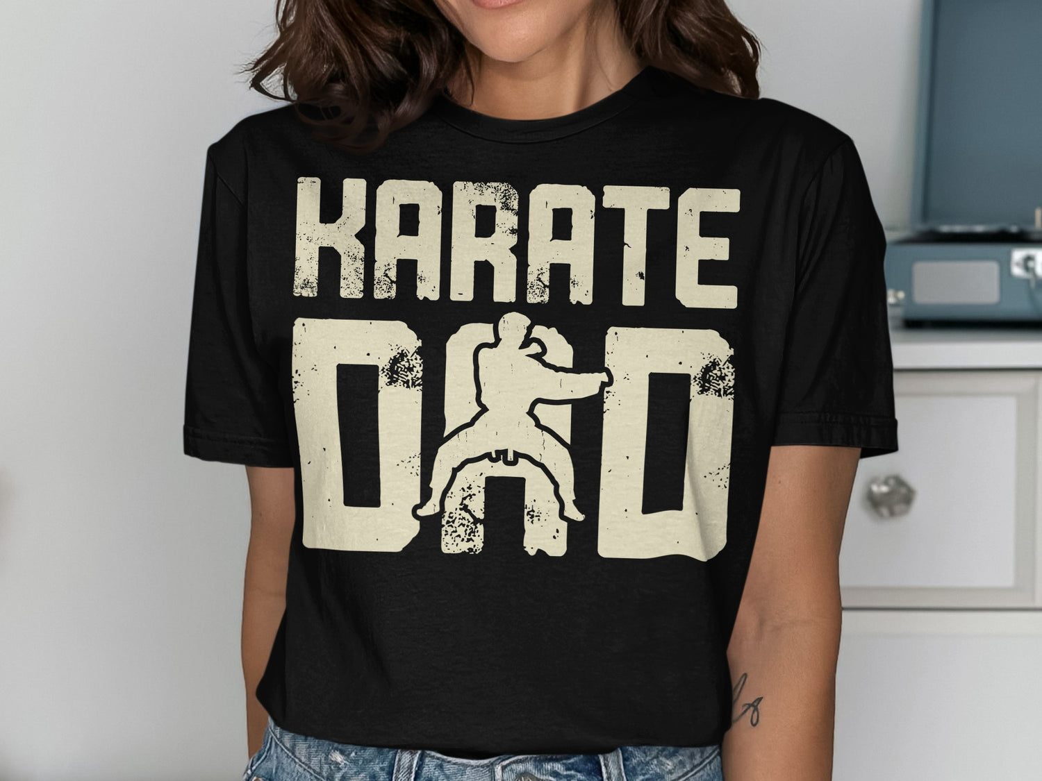 Black t-shirt with distressed "KARATE DAD" text and karate silhouette.