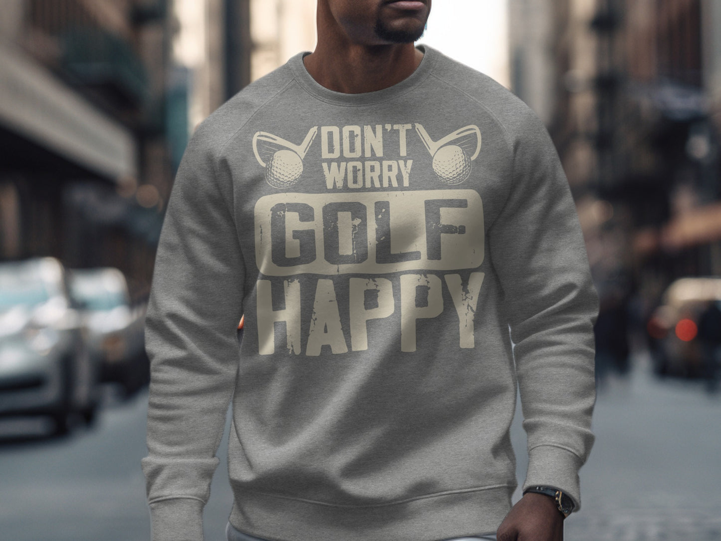 Grey sweatshirt with "Don't Worry Golf Happy" text and golf balls.