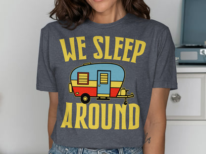 T-shirt with "WE SLEEP AROUND" text and vintage camper illustration.