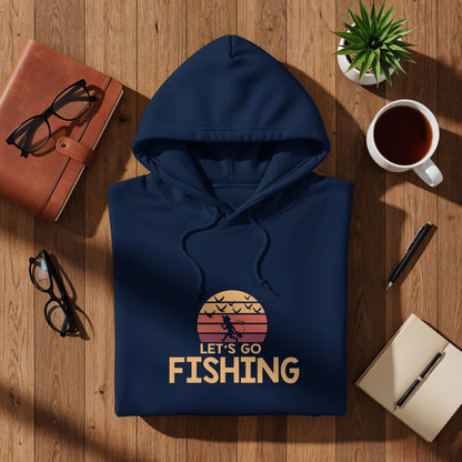 Navy blue hooded sweatshirt with "Let's Go Fishing" text and sunset graphic.
