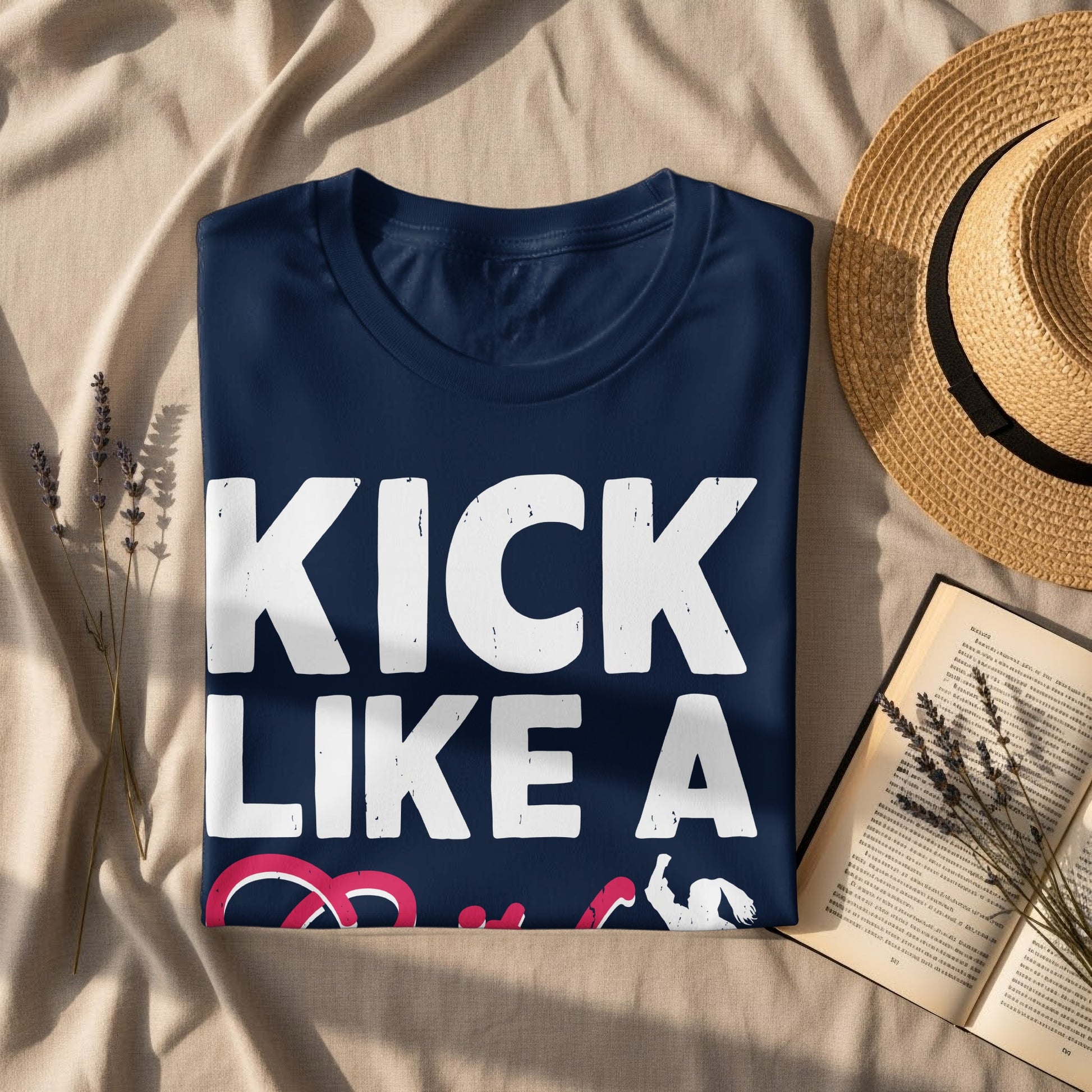Navy t-shirt with "KICK LIKE A GIRL" text and a pink ribbon.