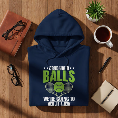 Navy hoodie with "Grab Your Balls We're Going to Play" text and tennis graphics.