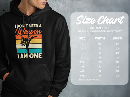 Hoodie with "I Don't Need a Weapon, I Am One" graphic and size chart.