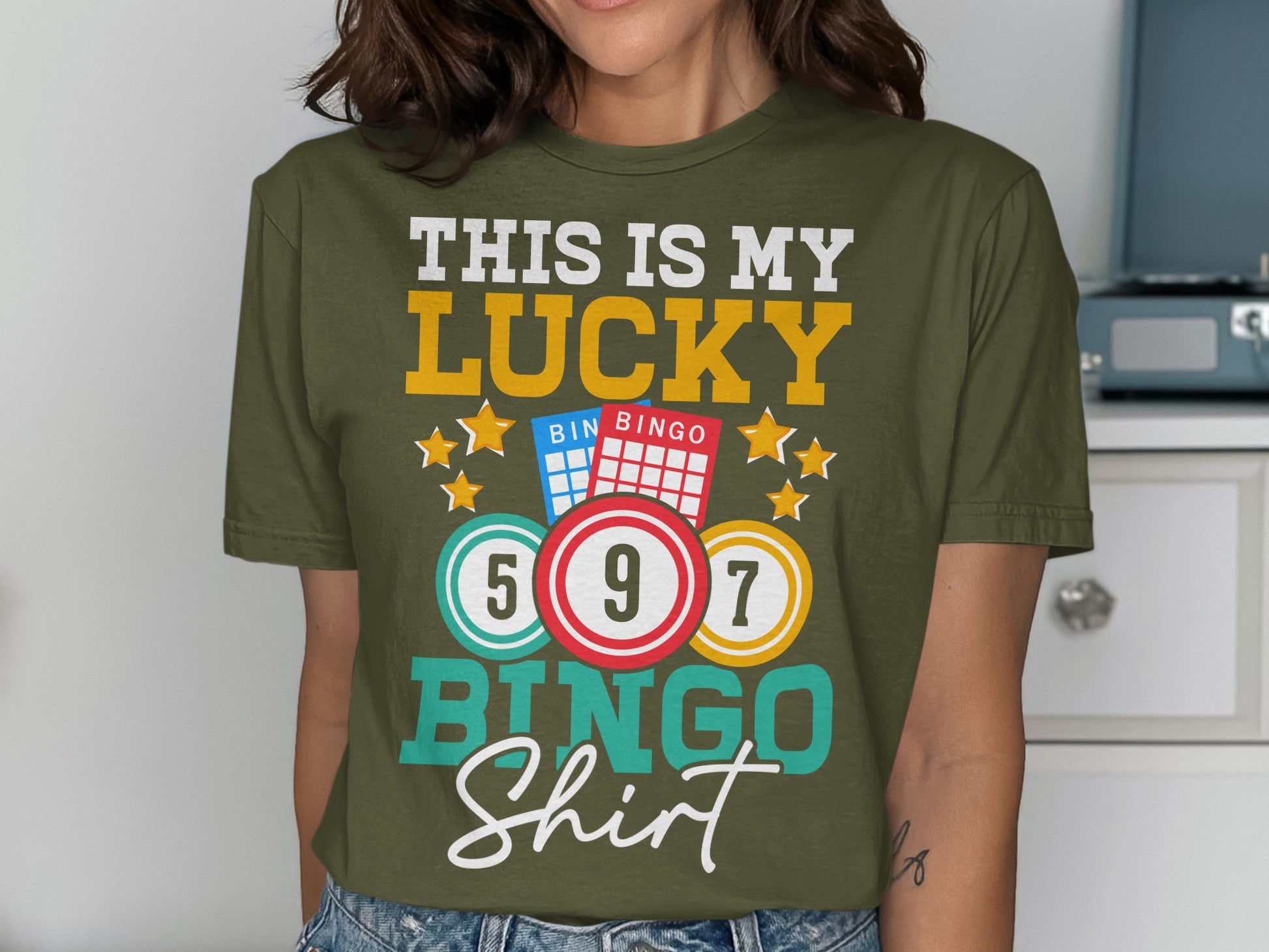 Green t-shirt with "THIS IS MY LUCKY BINGO Shirt" text and bingo cards.