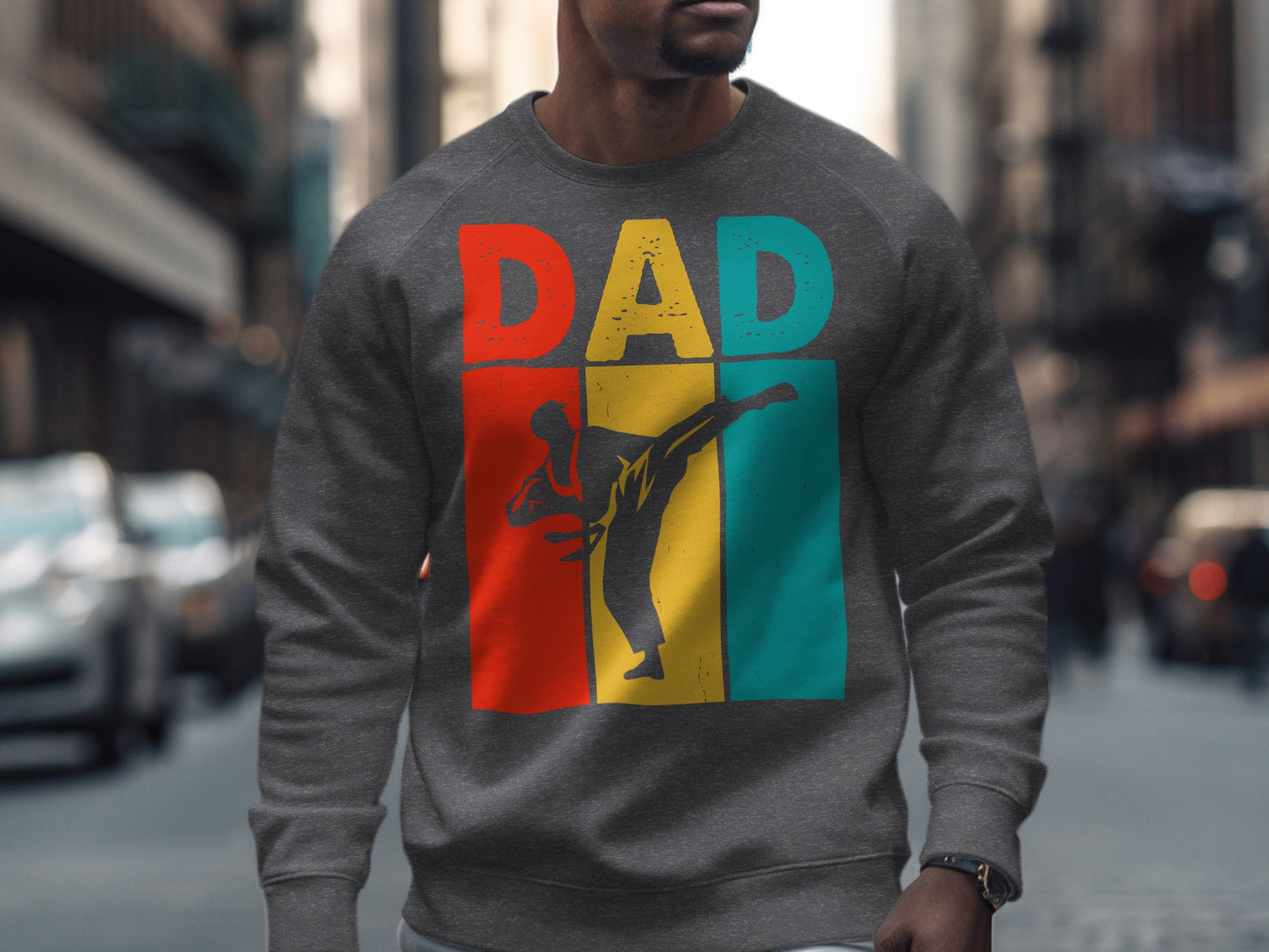 Dark gray sweatshirt with "DAD" in red and yellow, and a black karate silhouette.