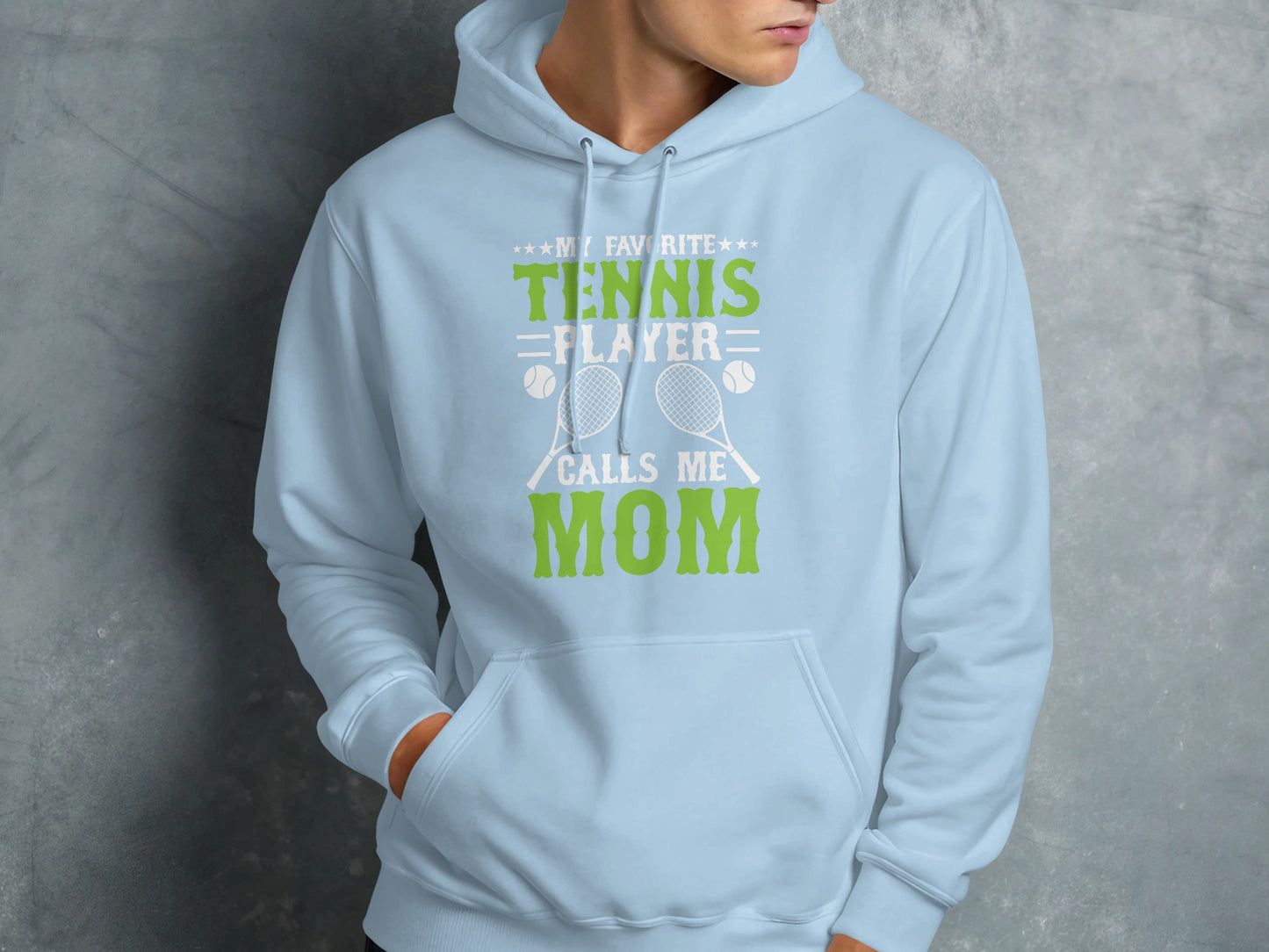 Light blue hoodie with "My Favorite Tennis Player Calls Me Mom" text and graphics.