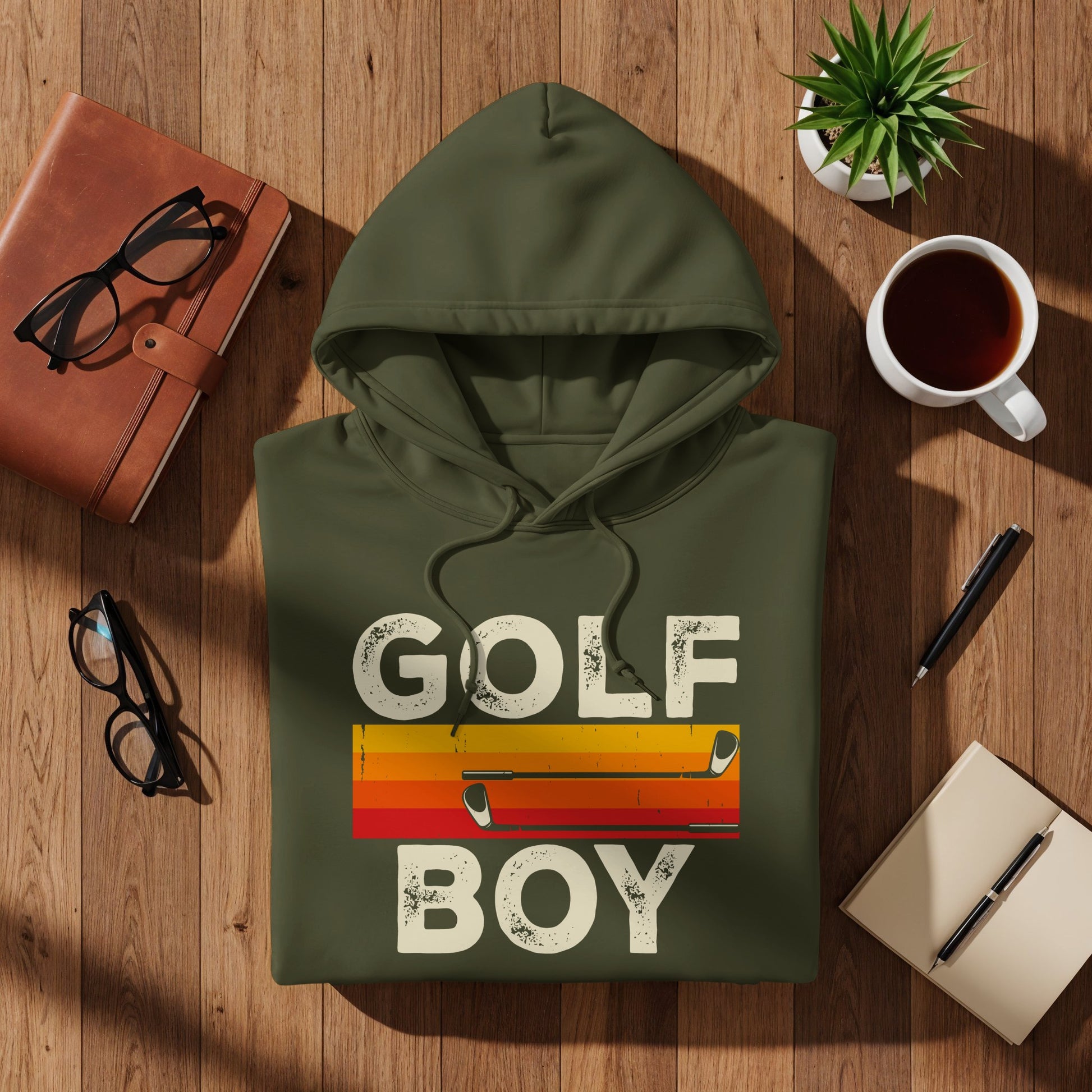 Green hoodie with "GOLF BOY" text and colorful striped graphic.