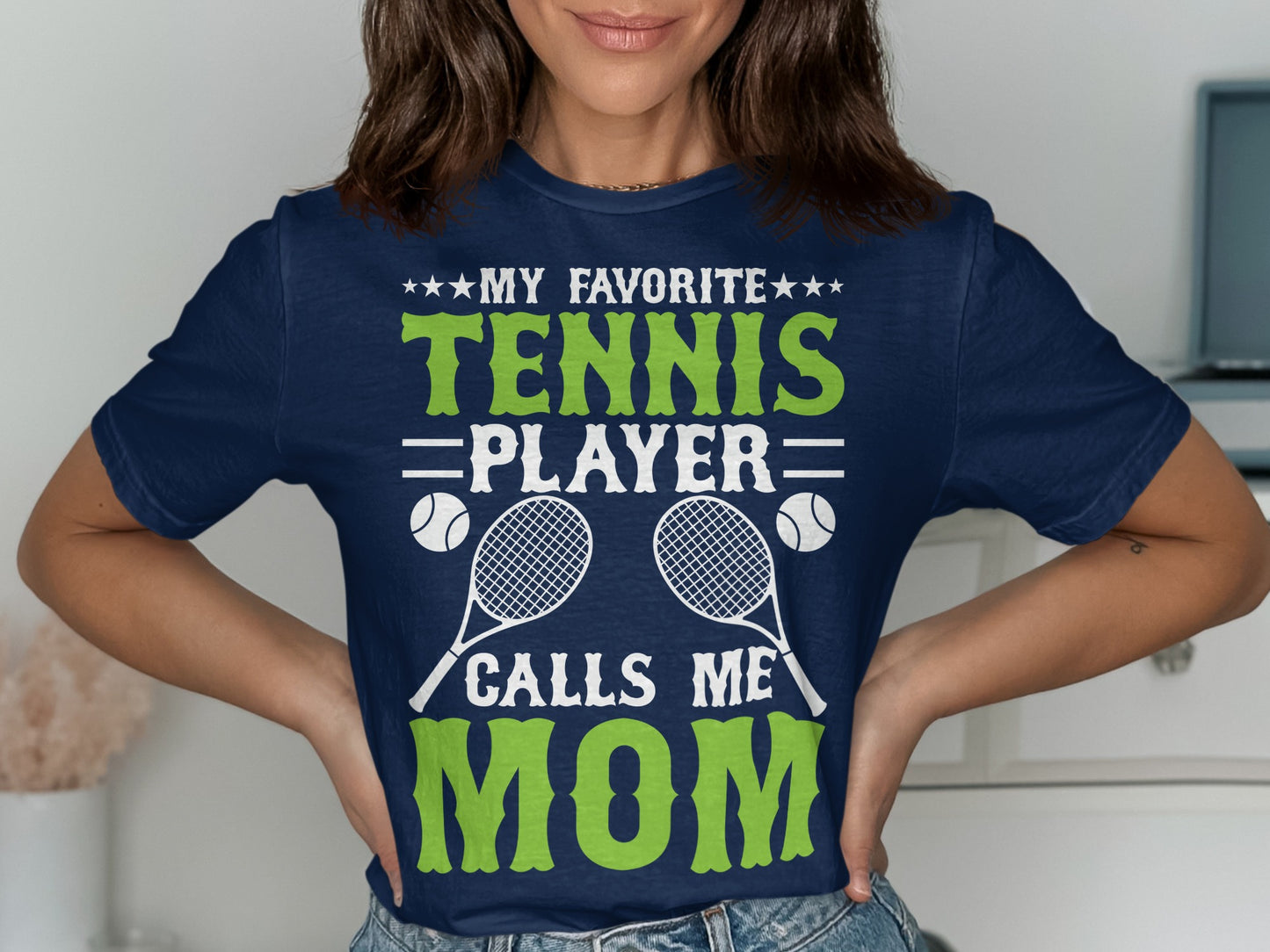 Navy t-shirt with text "My Favorite Player Calls Me Mom" and tennis graphics.