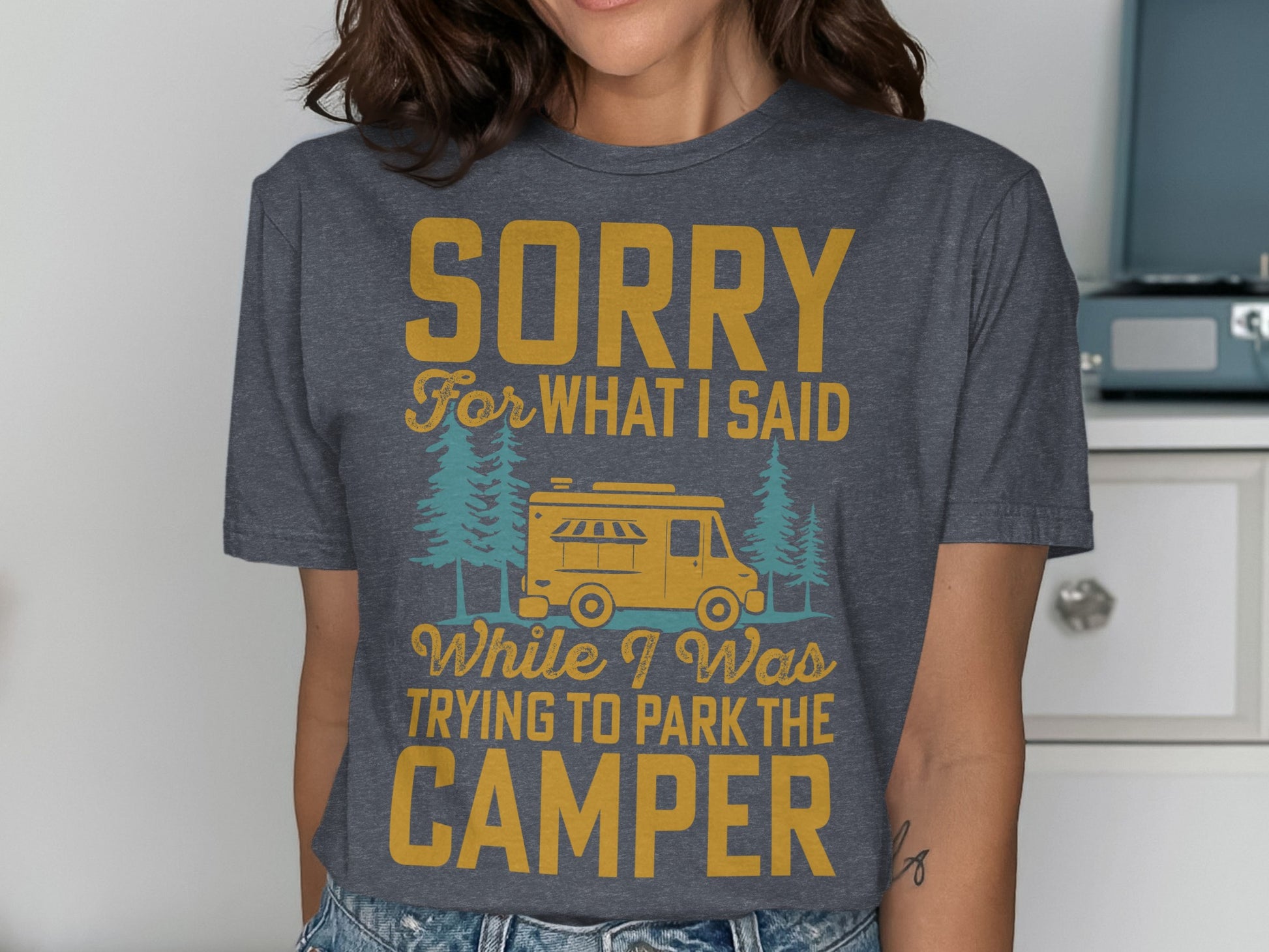 Dark grey t-shirt with text "SORRY FOR WHAT I SAID WHILE I WAS TRYING TO PARK THE CAMPER".