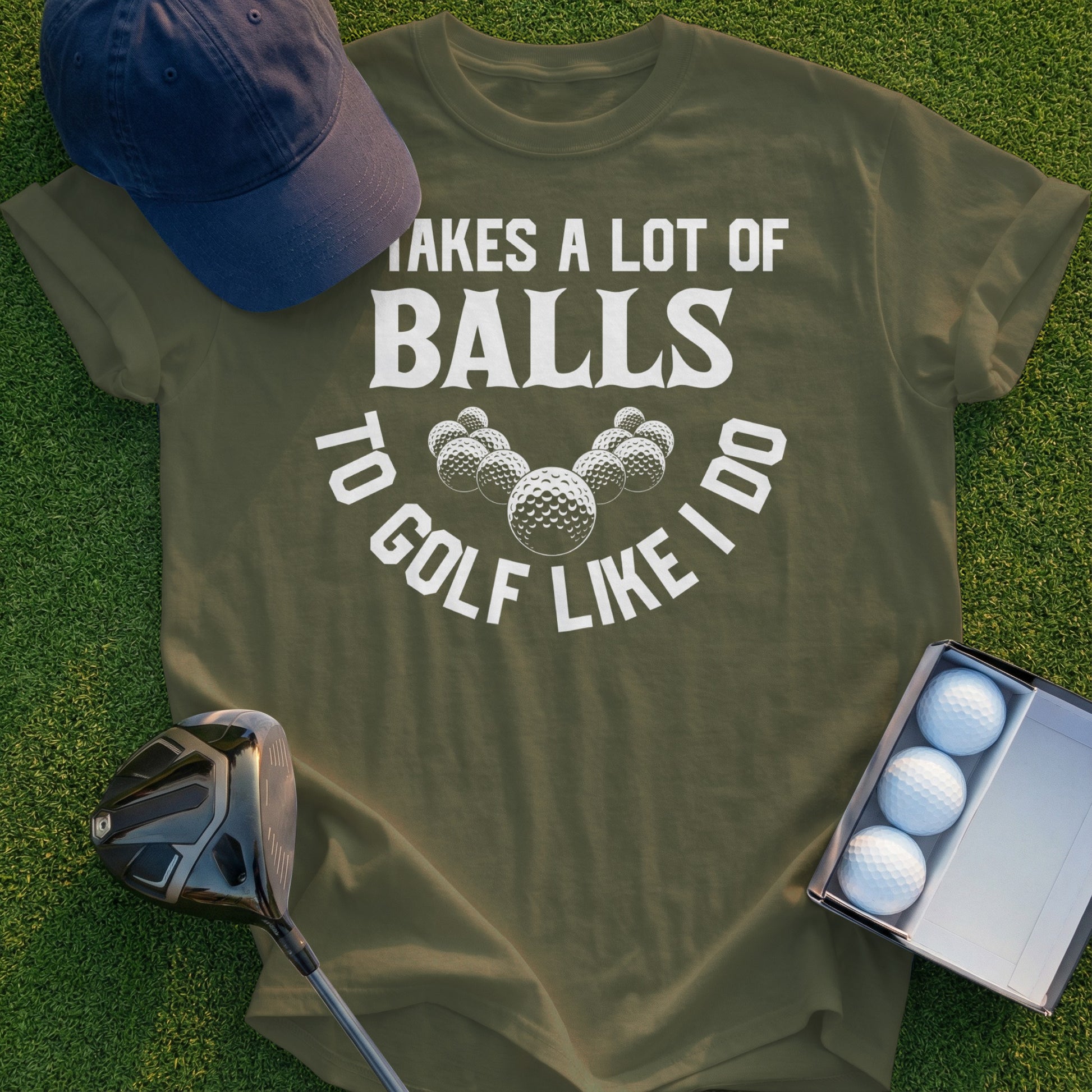 Olive t-shirt with "Takes a lot of balls to golf like I do" and golf ball graphics.