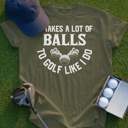 Olive t-shirt with "Takes a lot of balls to golf like I do" and golf ball graphics.