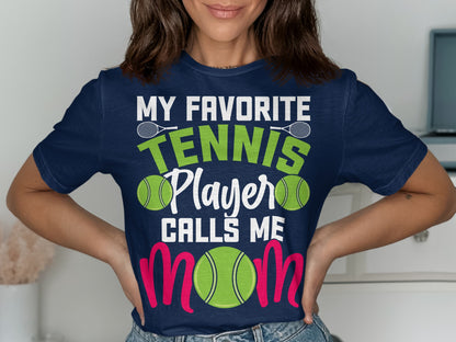 Navy t-shirt with "MY FAVORITE TENNIS PLAYER CALLS ME MOM" text and tennis imagery.