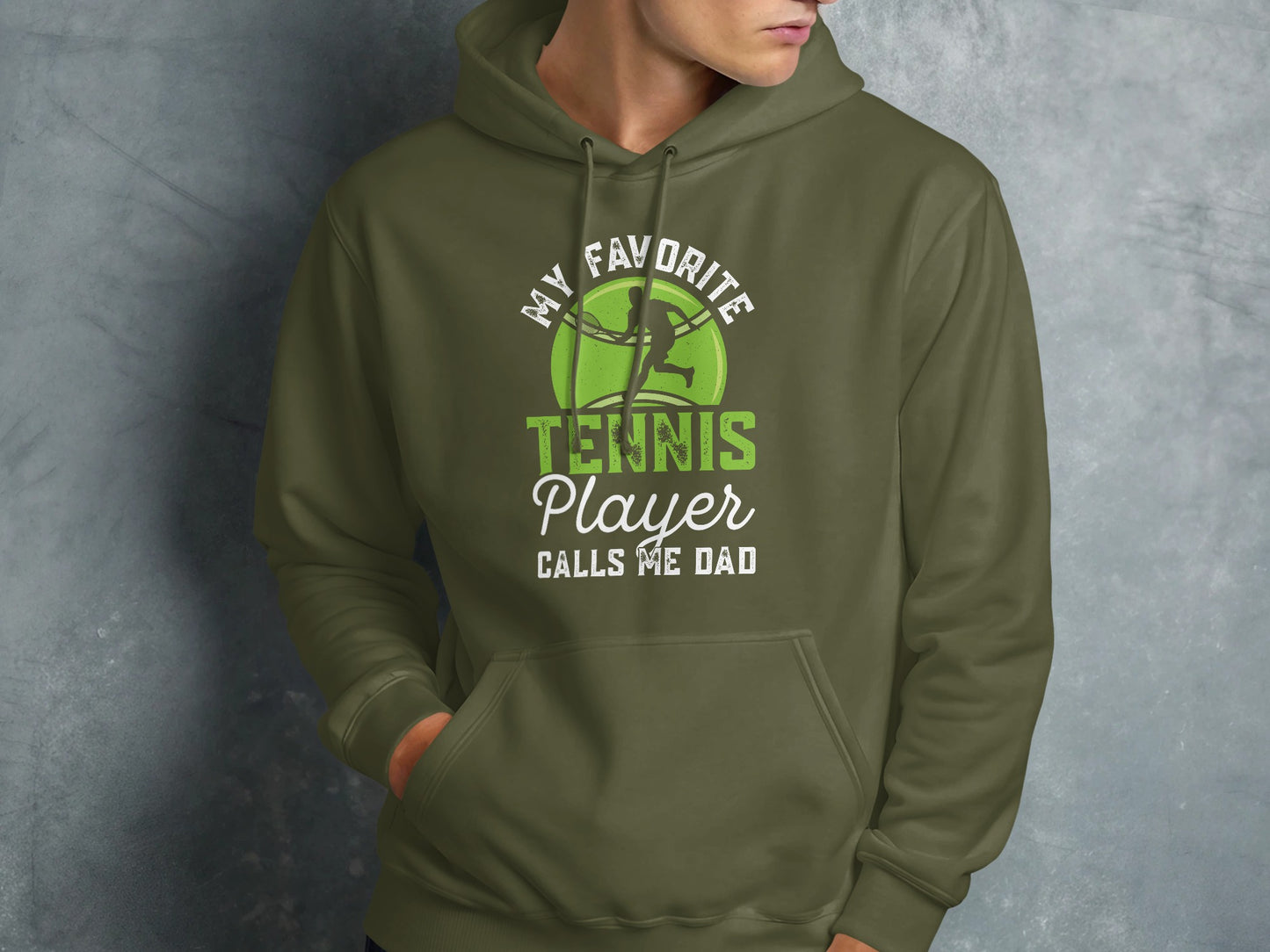 Olive green hoodie with "My Favorite Tennis Player Calls Me Dad" text.