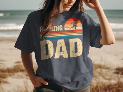 Dark blue t-shirt with "Running Dad" graphic and sunset illustration.