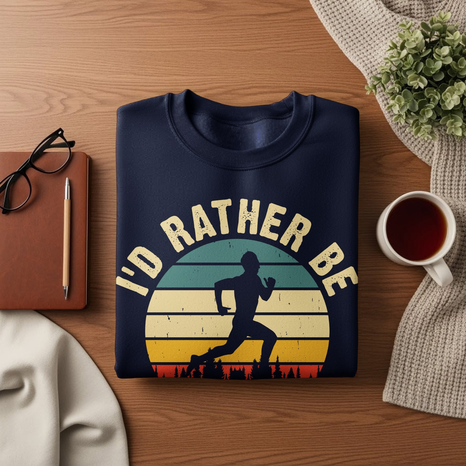 Navy sweatshirt with running graphic and text "I'd rather be running".