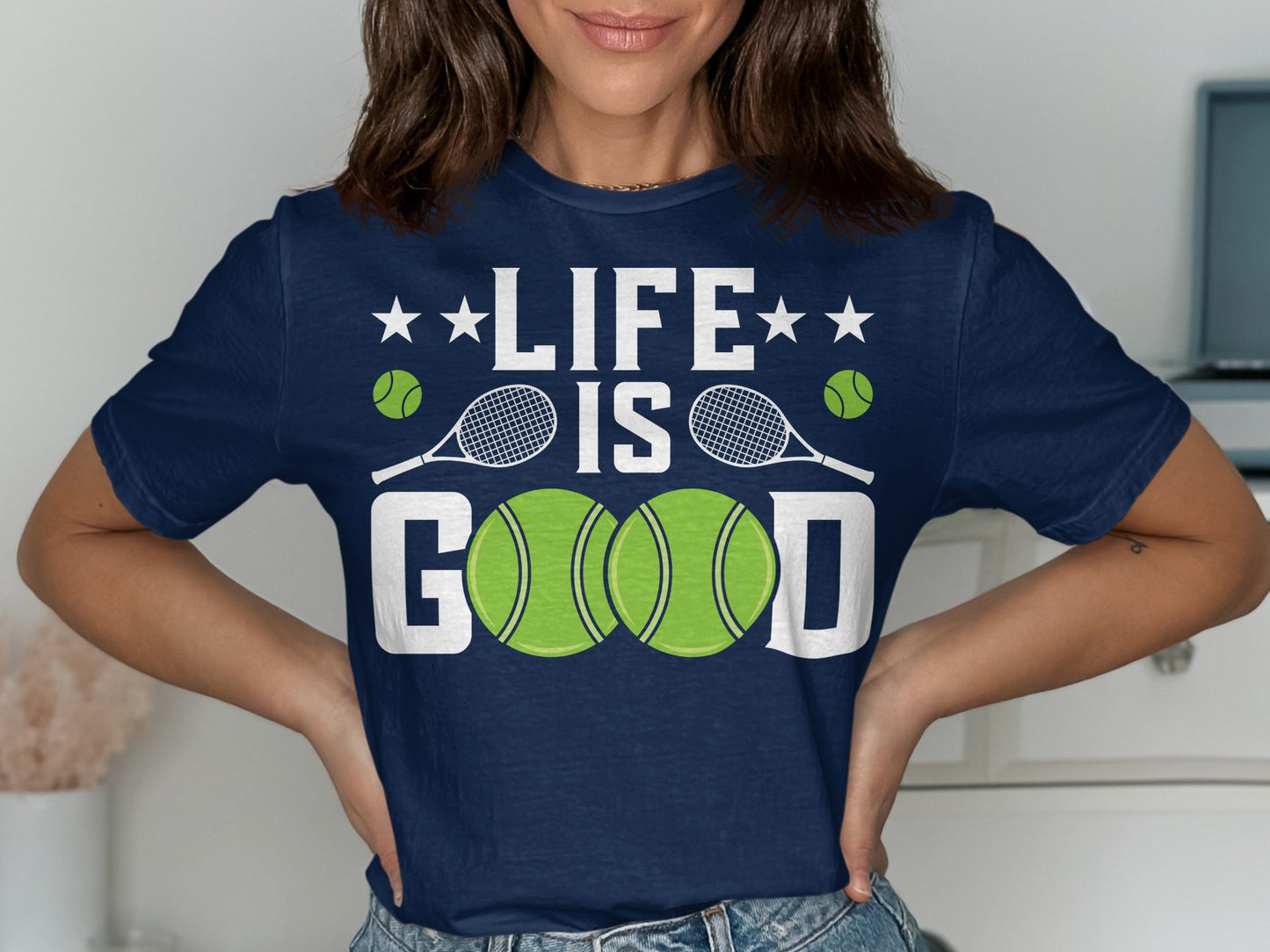 Navy t-shirt with "LIFE IS GOOD" text and tennis balls and racquets.