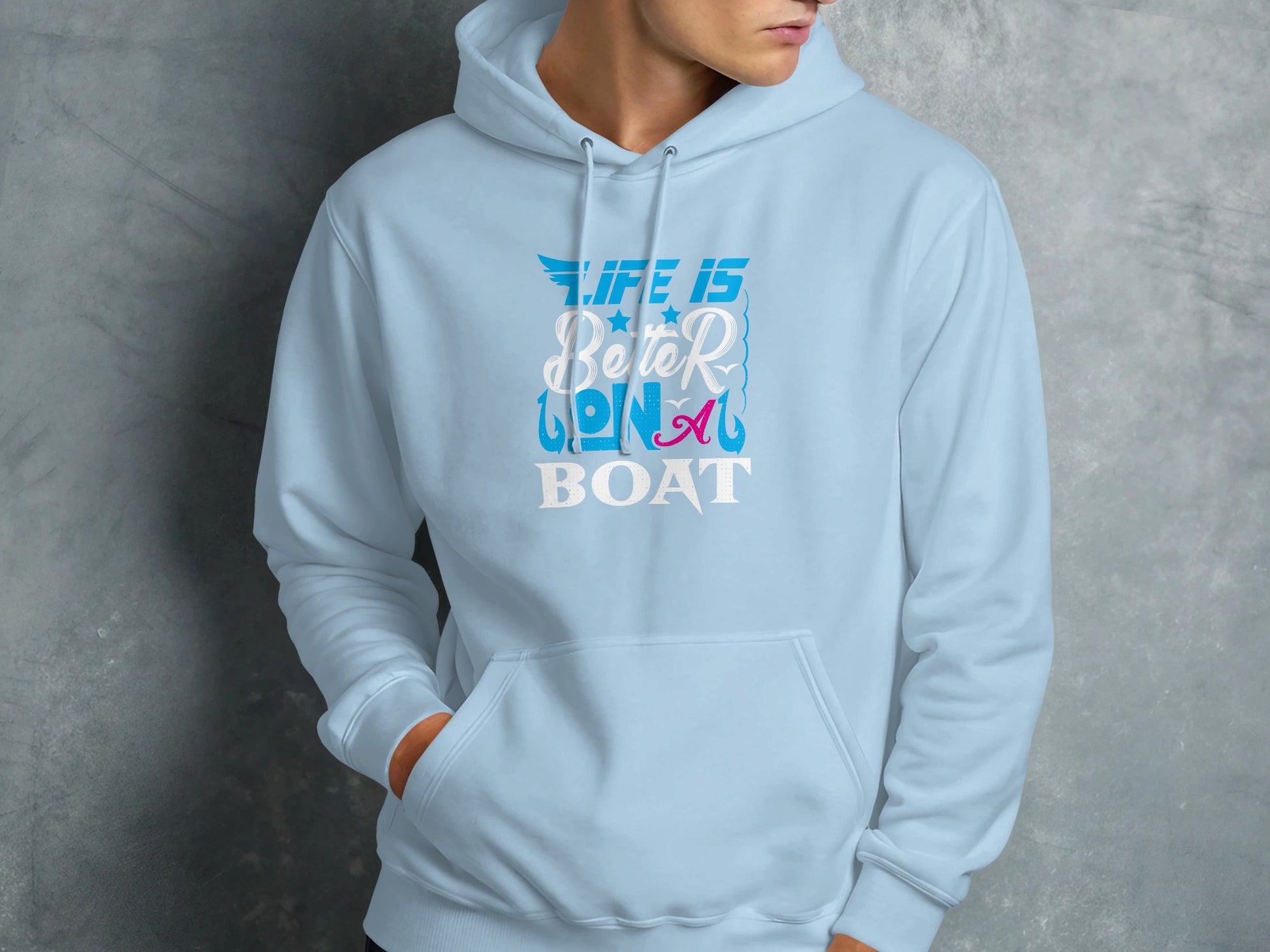 Light blue hoodie with "Life is better on a boat" text and design.