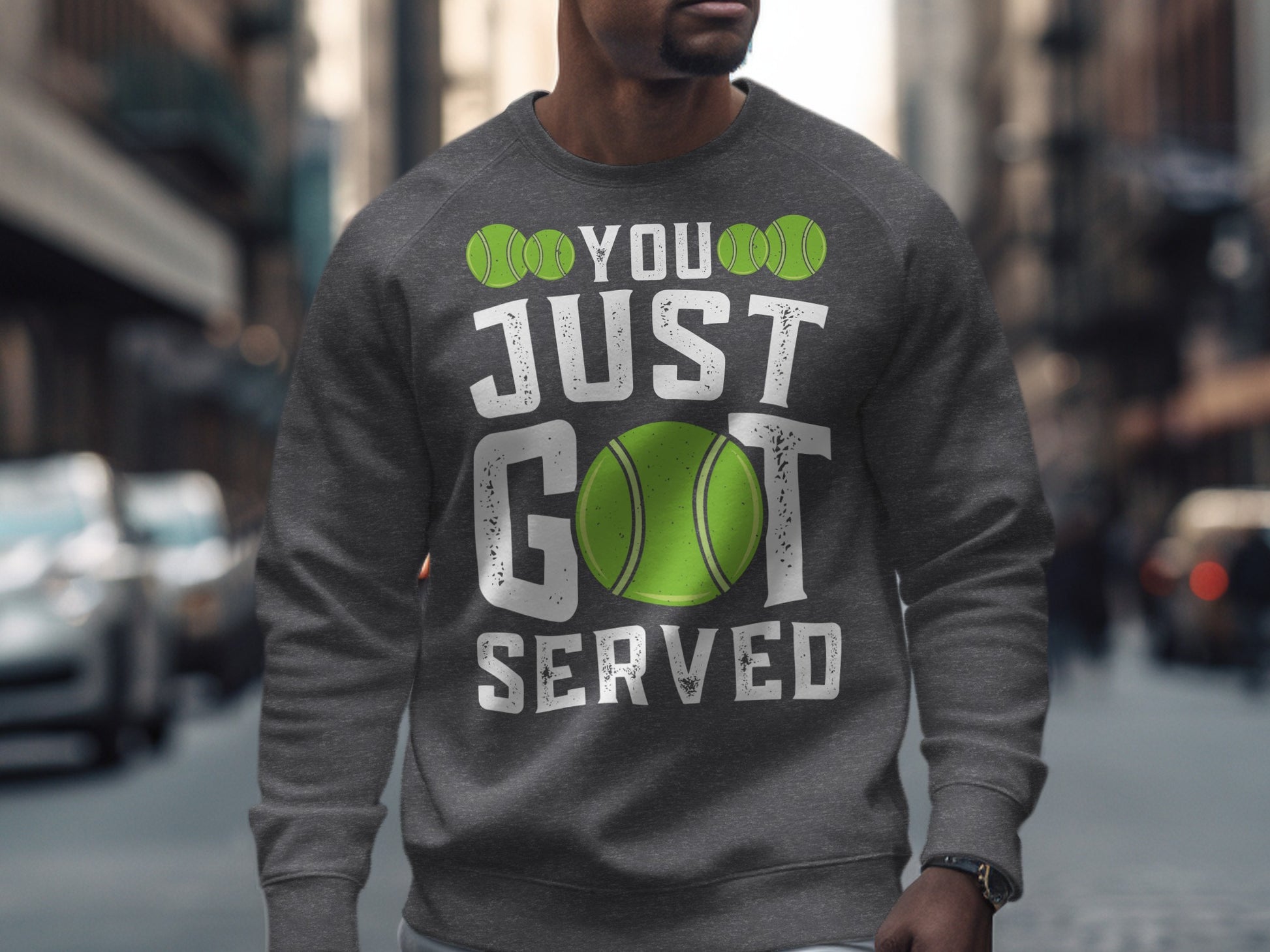 Gray sweatshirt with "You Just Got Served" and a tennis ball graphic.
