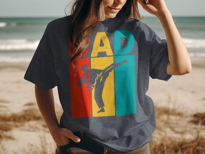Dad graphic t-shirt featuring a karate silhouette against colorful blocks.