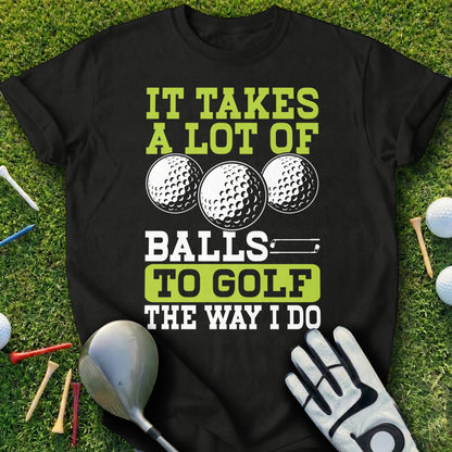 Black t-shirt with "It Takes A Lot of Balls To Golf The Way I Do" text and golf imagery.