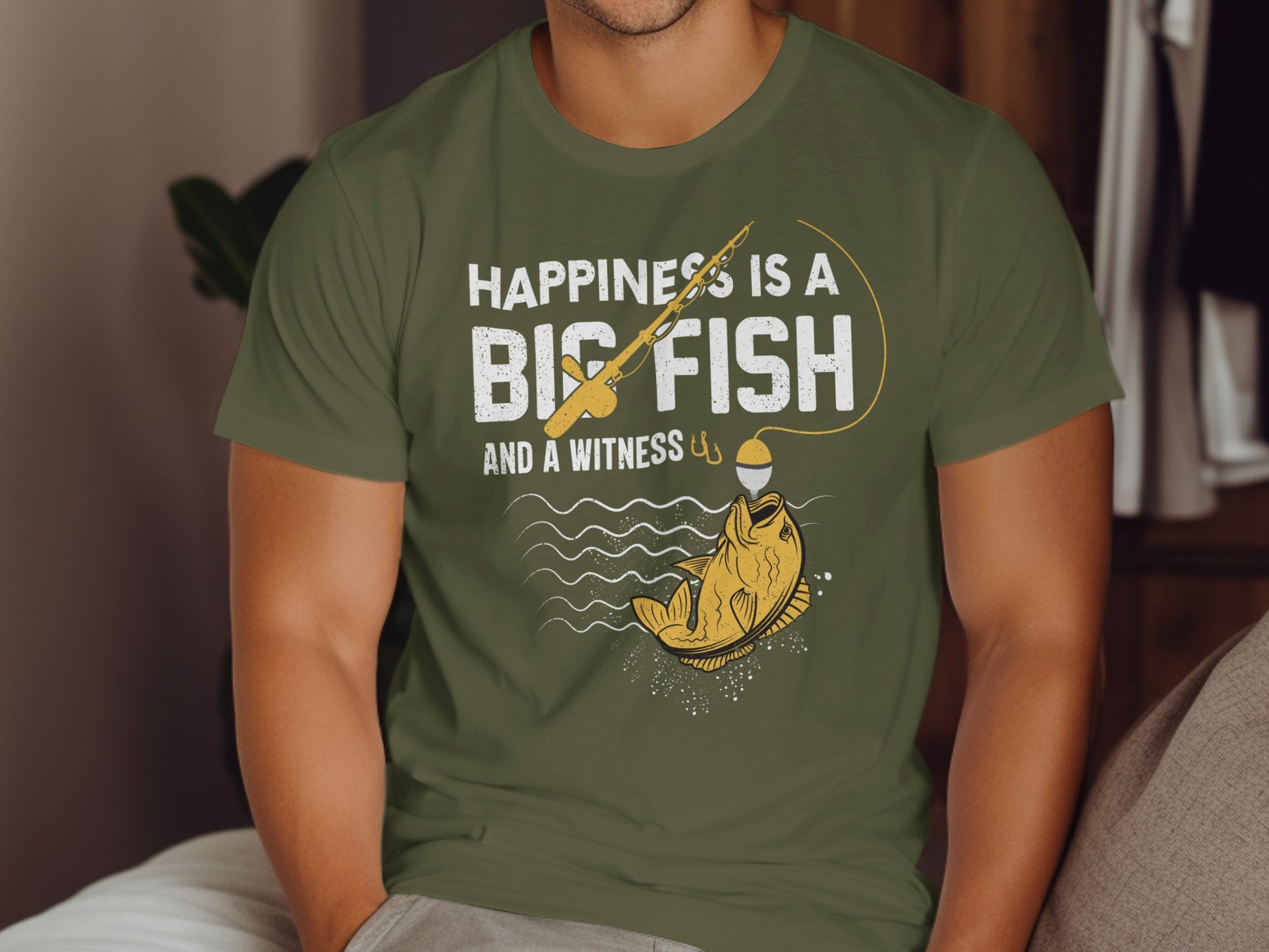 T-shirt with "Happiness is a big fish" text and fishing graphic.
