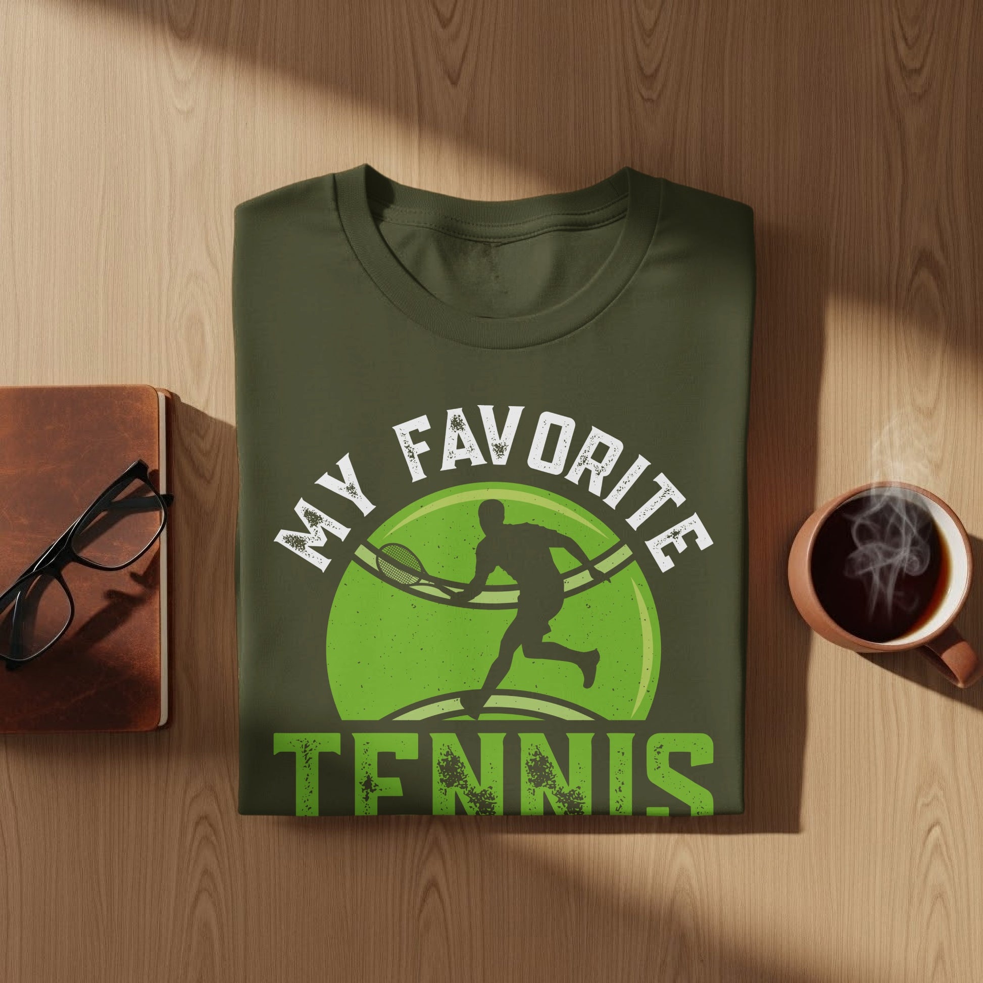 Green t-shirt with tennis player graphic and "MY FAVORITE TENNIS" text.