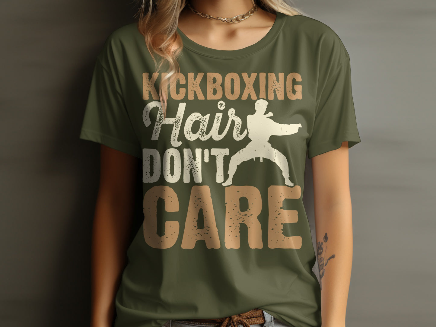 T-shirt with silhouette of person doing kickboxing and text "Kickboxing hair don't care".