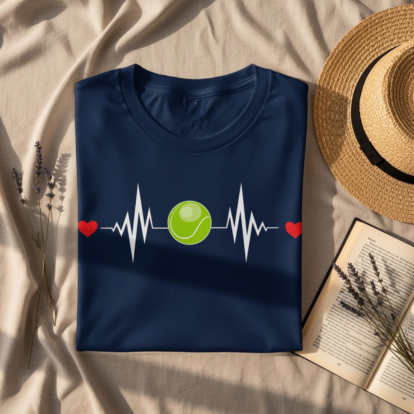 Navy t-shirt with tennis ball heartbeat design and red hearts.