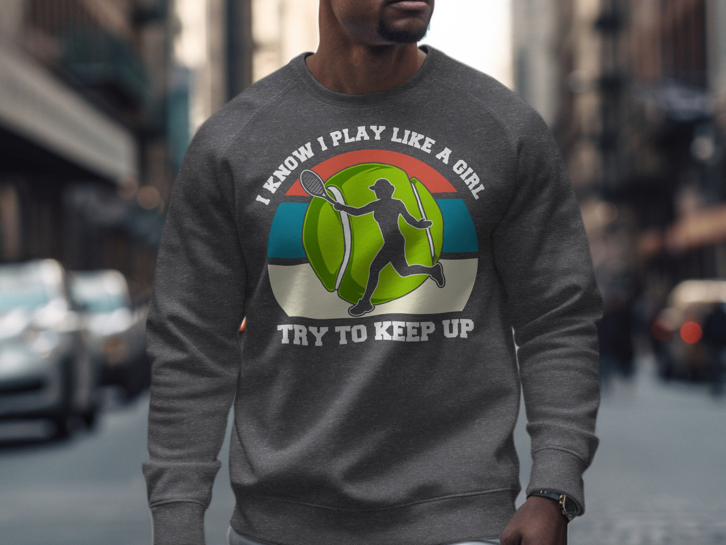 Gray sweatshirt with "I Know I Play Like A Girl Try To Keep Up" and tennis graphic.