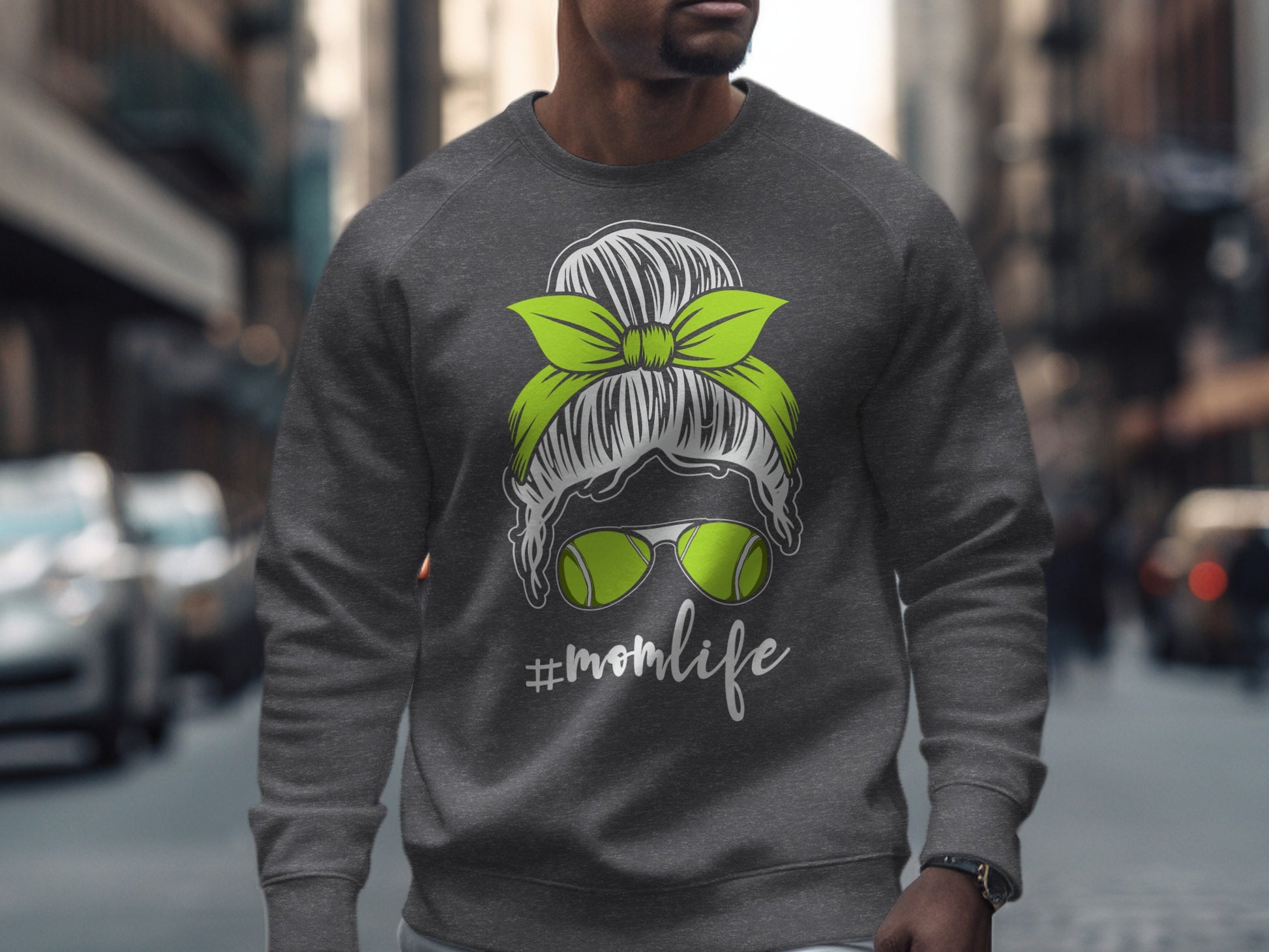 Grey sweatshirt with lime green messy bun, sunglasses, and "#momlife" text.