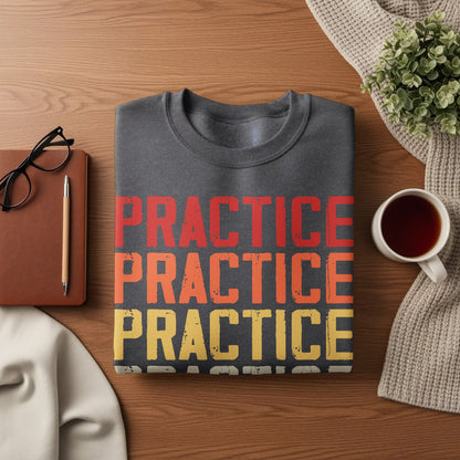Dark grey sweatshirt with "PRACTICE" repeated in red, orange, and yellow.