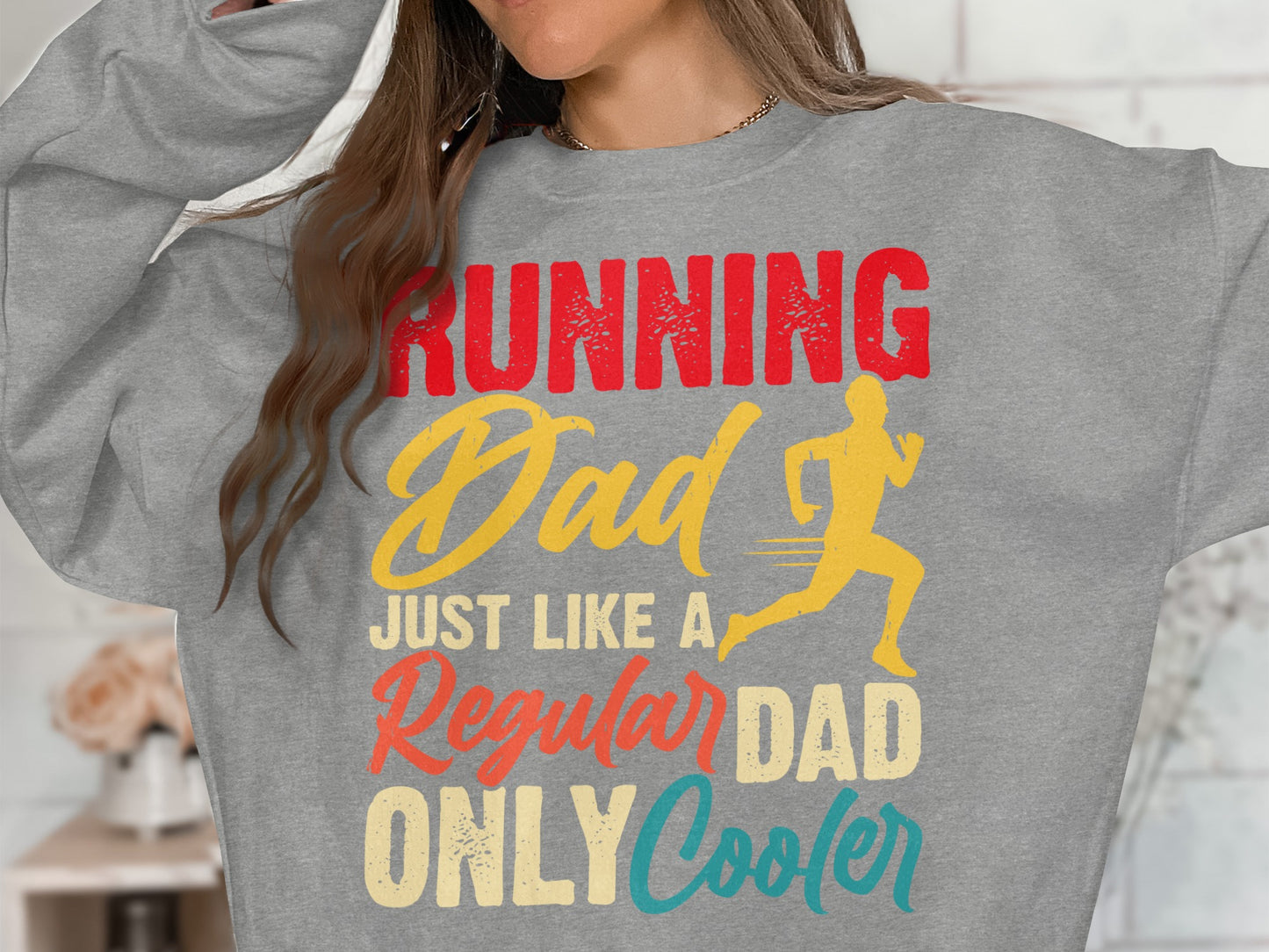 Grey sweatshirt with "Running Dad Just Like A Regular Dad Only Cooler" text and runner graphic.