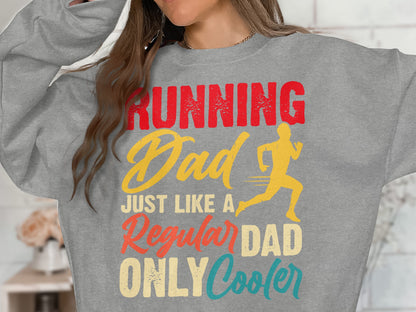 Grey sweatshirt with "Running Dad Just Like A Regular Dad Only Cooler" text and runner graphic.