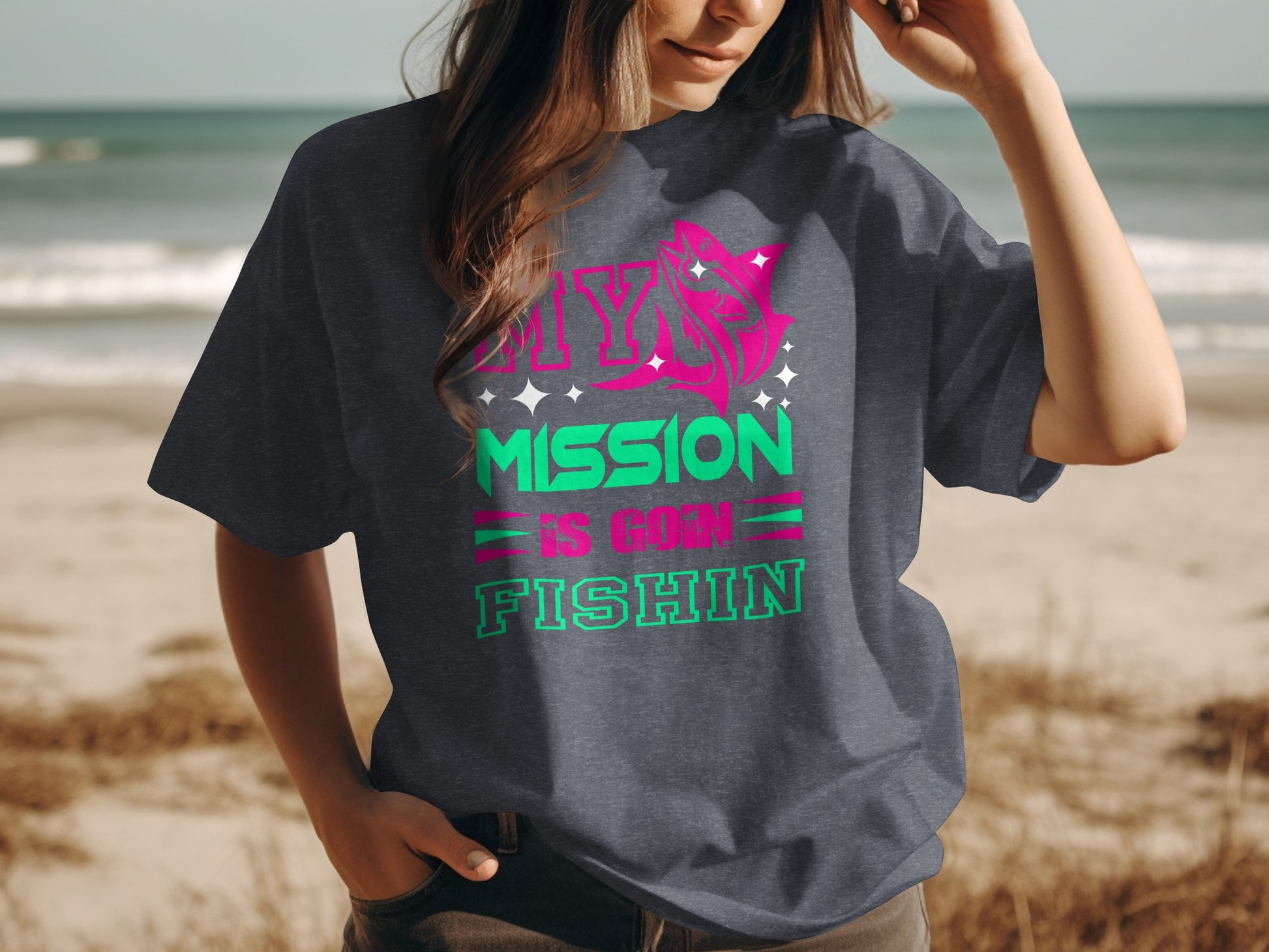 Dark t-shirt with neon green graphic "MY MISSION IS GONNA FISHIN".